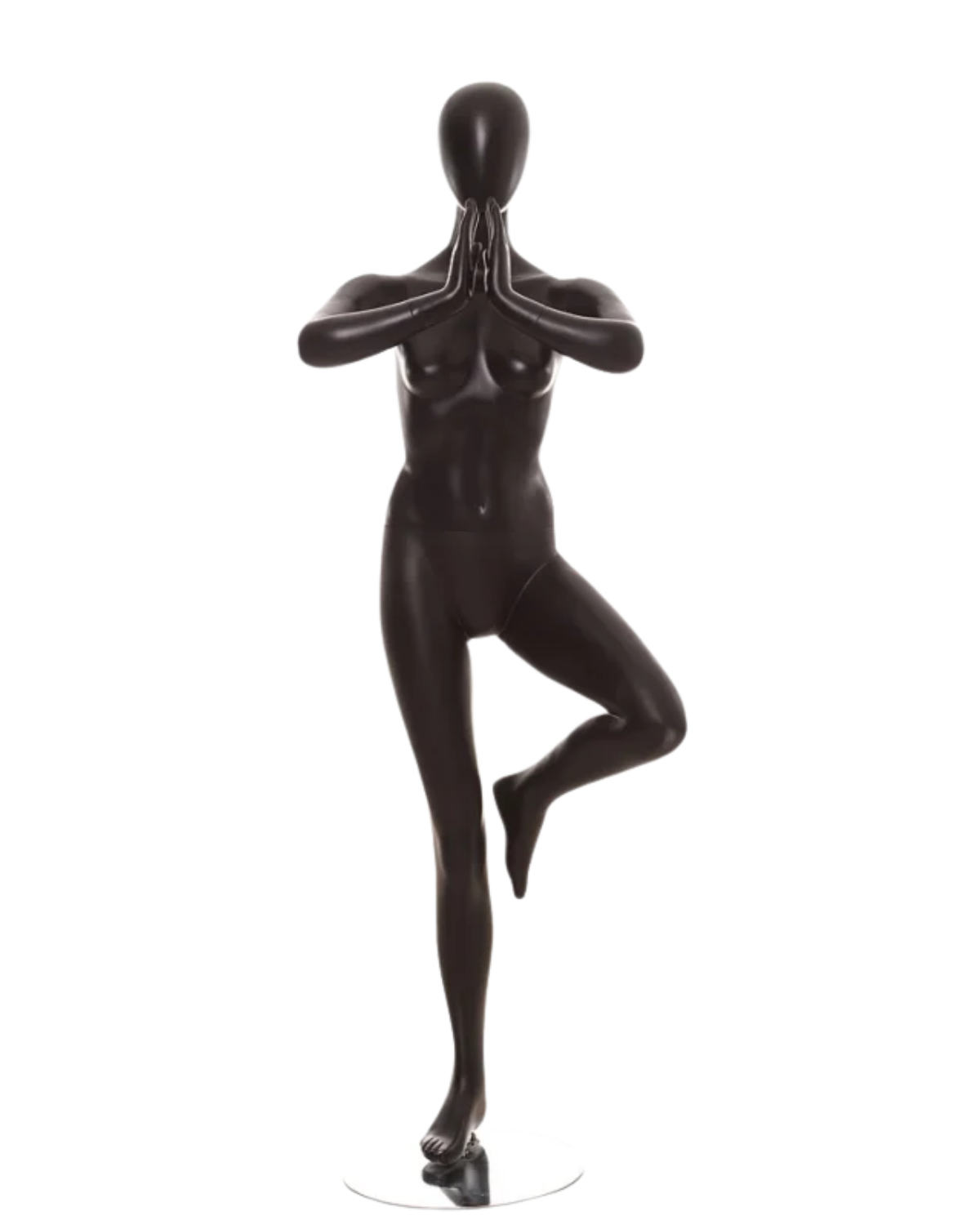 A glossy black female mannequin figure posed in a yoga tree pose on a plain white background.