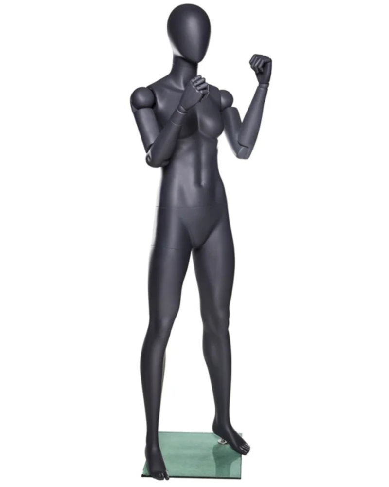 Gray posable female mannequin with flexible arms and egghead design, ideal for athletic display and versatile mannequin modeling.