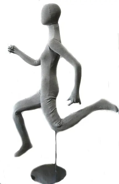 Posable female mannequin made of foam, displayed in grey color, showcasing flexible, realistic female form for retail displays.
