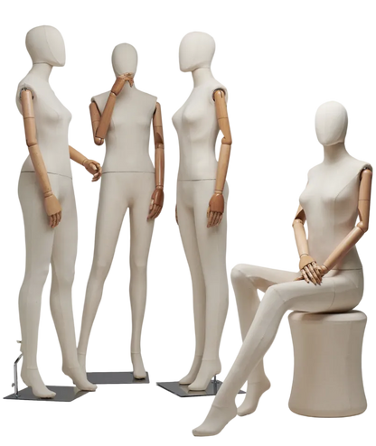 Female fabric-wrapped posable mannequin with articulated arms, available in various finishes, used for displaying clothing.