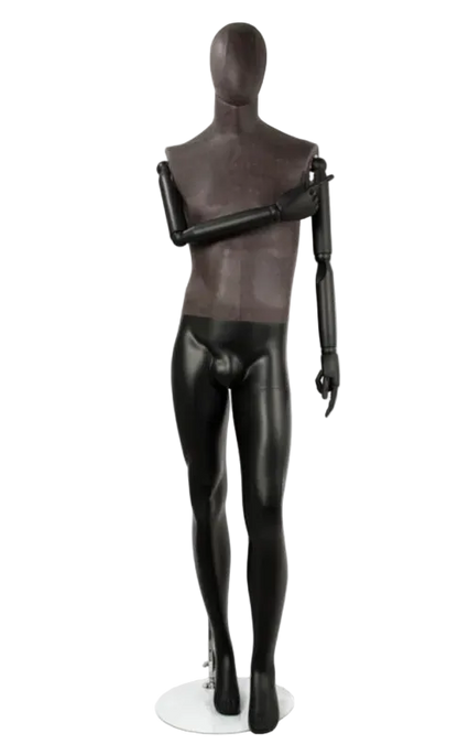 Front view of distressed leather-like male mannequin with bendable wooden arms and pointing pose