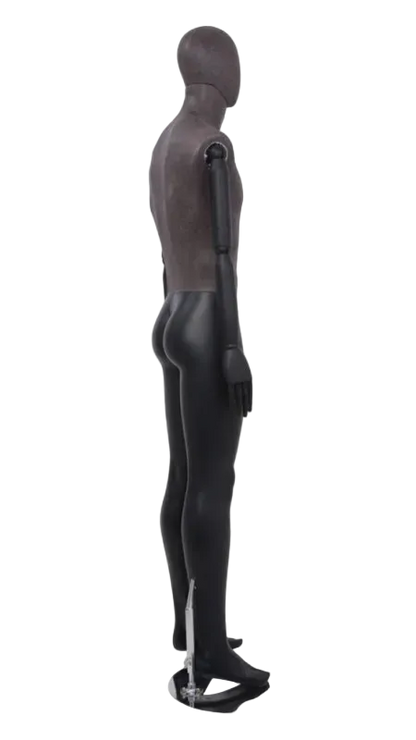 Side view of distressed leather-like mixed fabric male mannequin with bendable wooden arms