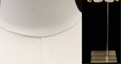 Detail view of white linen mannequin fabric and brushed metal base