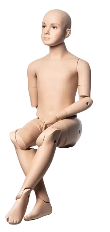 Realistic posable 10T child mannequin seated in lifestyle display position