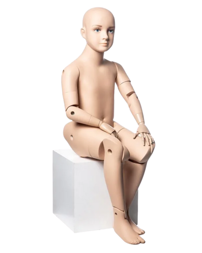 Realistic posable 6T child mannequin seated in lifestyle display position